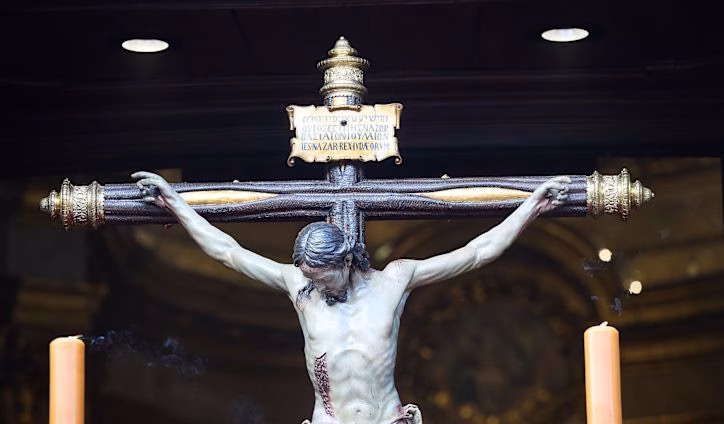 CATHOLIC PRIEST SLAIN ON ALTAR BY FALLING CRUCIFIX